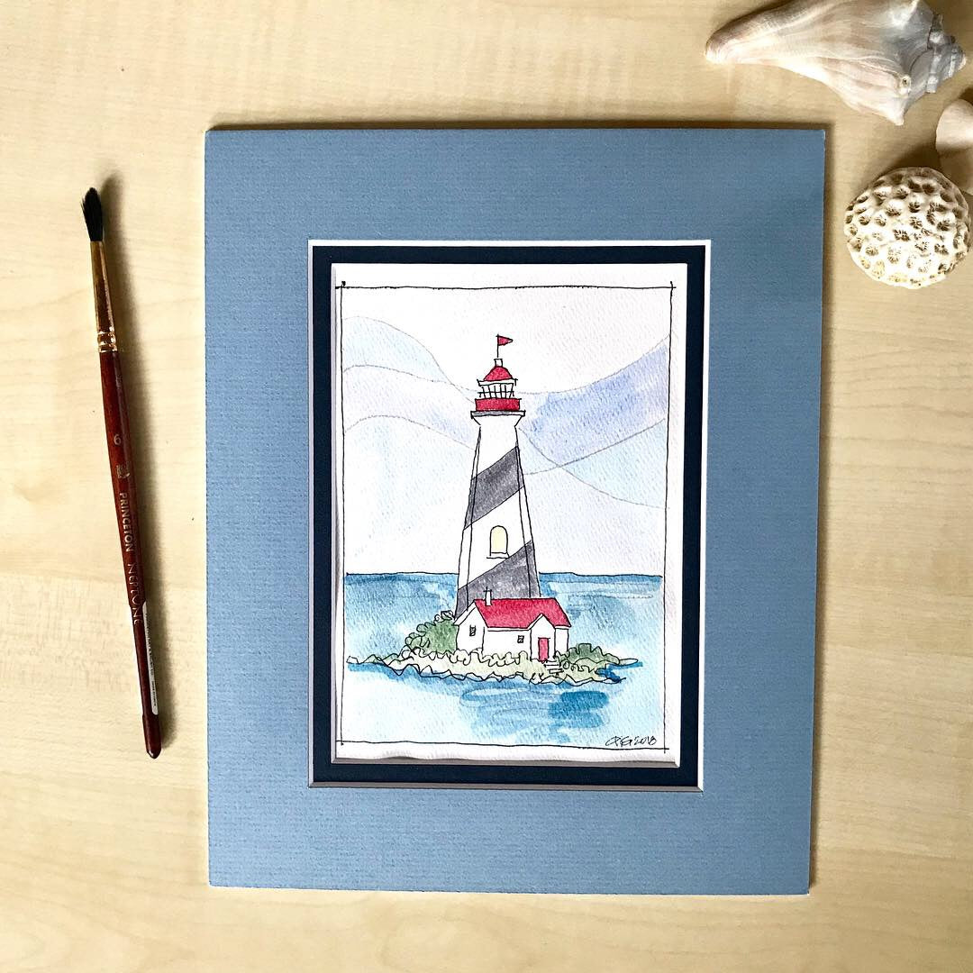 8x10 dusty blue matte framed  around  hand painted card of Island Lighthouse III.  The greeting card can be gifted as orginal art.